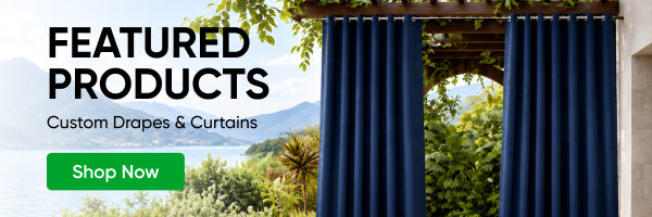 A promotional banner for custom drapes and curtains, showing dark blue curtains hanging on a pergola with a scenic outdoor background. Large text on the left reads 'FEATURED PRODUCTS' and 'Custom Drapes & Curtains,' with a green 'Shop Now' button.