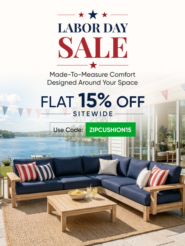 Labor Day sale banner: navy cushions with red-white striped pillows, flat 15% off sitewide with code ZIPCUSHION15