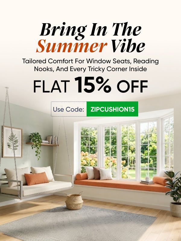 Custom window seat cushions in terracotta on a bay window reading nook