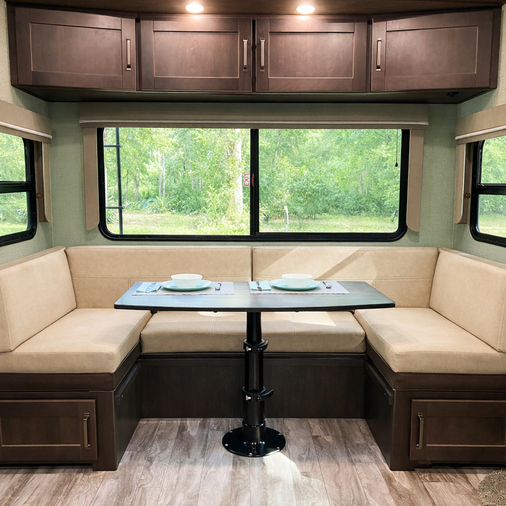 Comfortable RV dining space with forest view